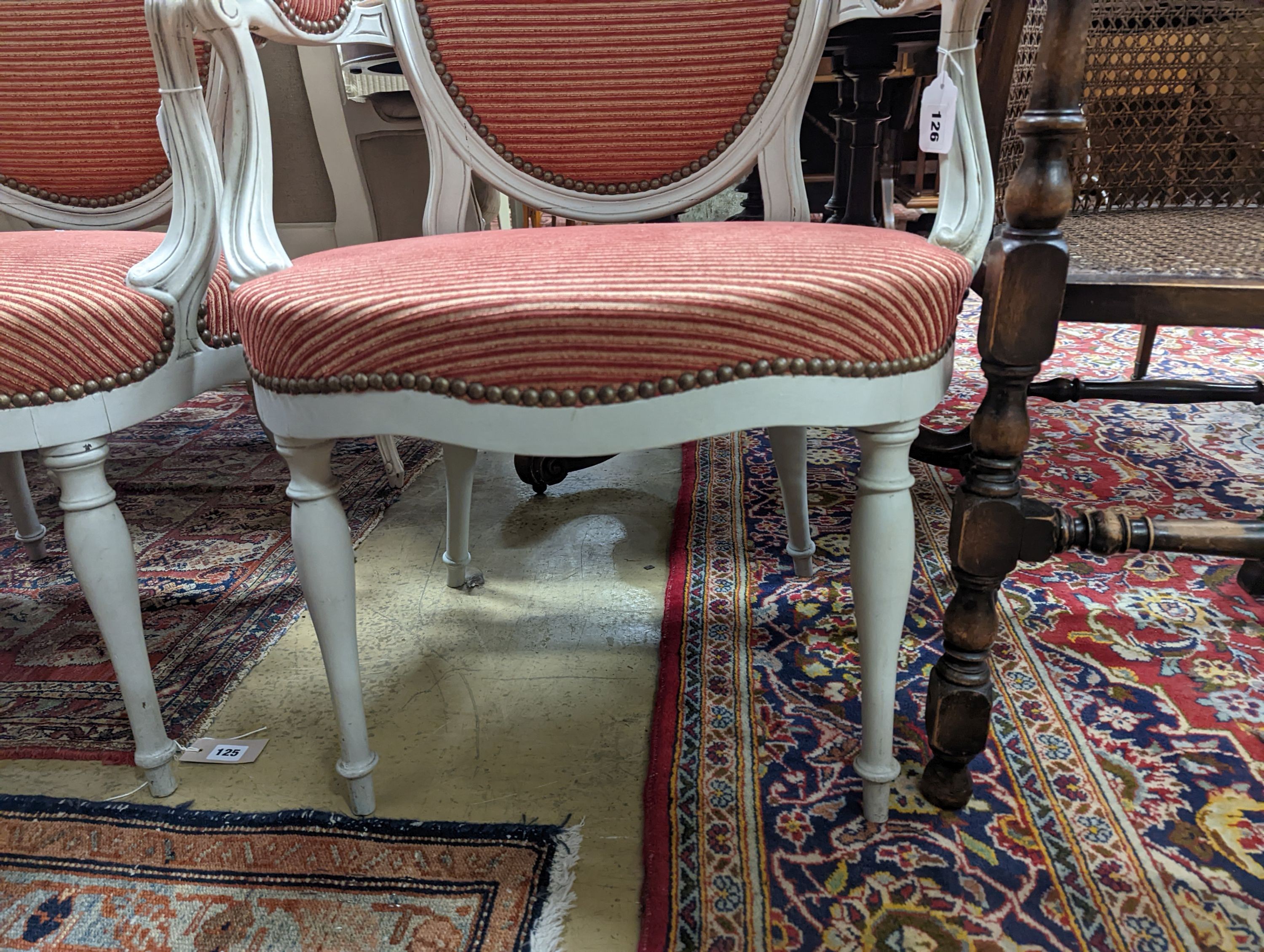 A pair of early 20th century French painted upholstered armchairs, width 59cm, depth 48cm, height 89cm